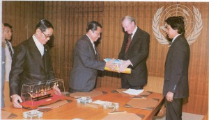 World Peace Envoy, Dr. Suchart Kosolkitiwong, President of the IFR, was seen presenting to H.E. Dr. Kurt Waldheim, the UN Secretary-General, a Peace  Referendum Record together with samples of one million signatures given by 90 percent of peace-loving Thai people at the UN Headquarters, New York, the U.S.A.,on November 5,1980.