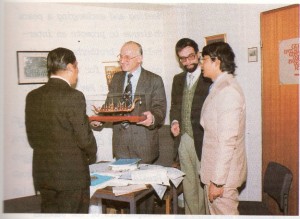 World Peace Envoy meeting and presenting a Royal Thai Barge in miniature, a symbol for peace co-operation, to Rev. Herr Kemper, Vice-President of the Evangelist in Frankfurt, the Federal Republic of Germany (Nov. 14, 1980).