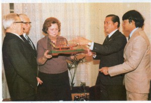 World Peace Envoy presenting a Thai Royal Barge in miniature to Mrs.Ilona Sebestyen, President of the World Peace Council in Hungary on the occasion of their meeting to seek mutual co-operation for world peace.
